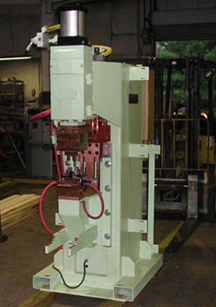 100 kva press type projection welder with fork lift rails and tooling mounting  control on back for close welder location